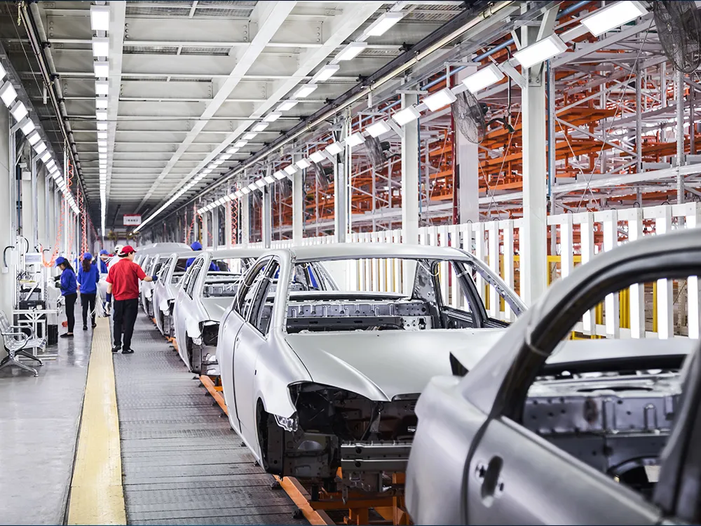 Automotive production line with assembled vehicle bodies